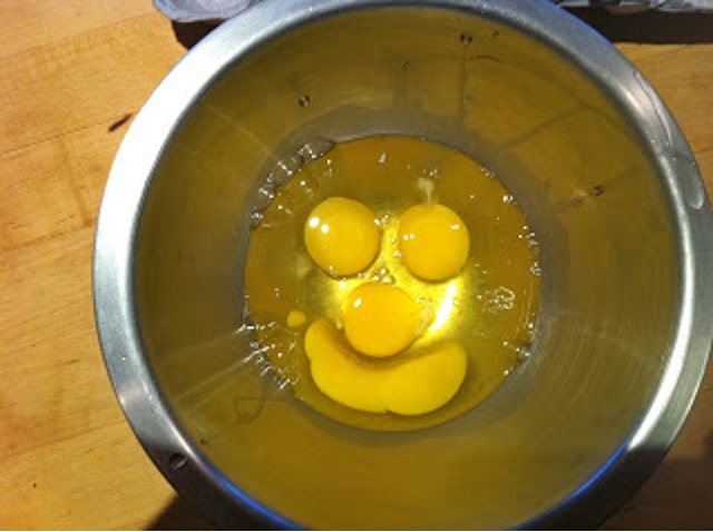 Yolks in bowl that look like a smiling face